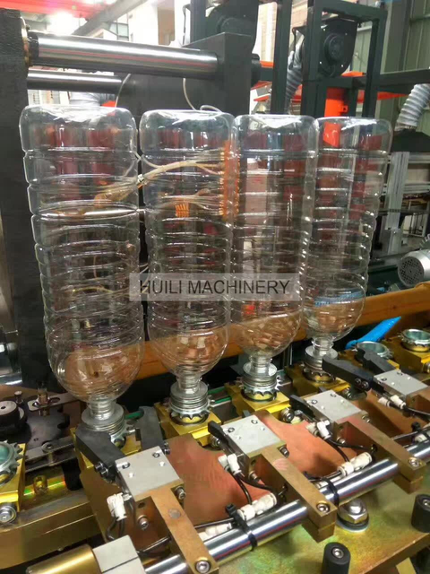 Новейшая горячая продажа, полностью автоматическая машина для выдувного формования ПЭТ-бутылок для сока с 4 полостями емкостью 2 литра